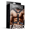 Fabrio male chest harness made of vegan leather, featuring black straps, o-rings and mental studs. From Eden&#39;s Temple fetish wear Ireland.